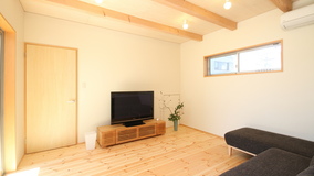 庭を囲むＬ型プランの家